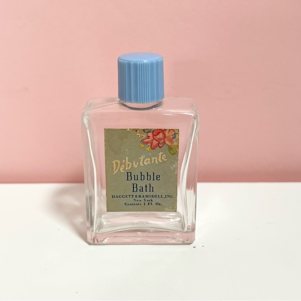 Vintage retro art deco pastel bubble bath empty glass bottle